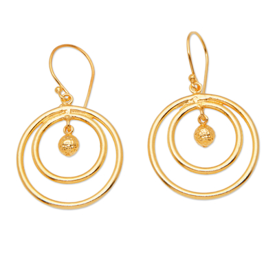 Gold-plated dangle earrings, 'Swinging Sphere' - Round 18k Gold-Plated Brass Dangle Earrings from Bali