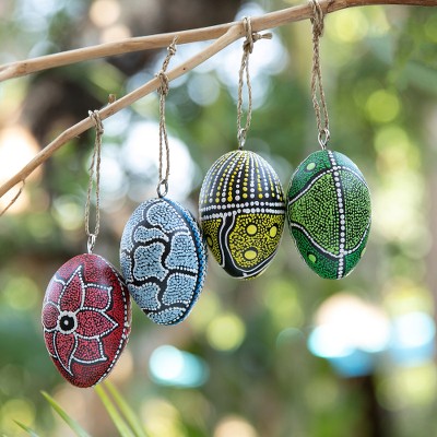 Wood ornaments, 'Colors of the Earth' (set of 4) - Set of 4 Oval Wood Ornaments Hand-Carved and Painted in Bali