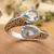 Blue topaz wrap ring, 'Two Marvels' - Sterling Silver Wrap Ring with Two Faceted Blue Topaz Stones (image 2) thumbail