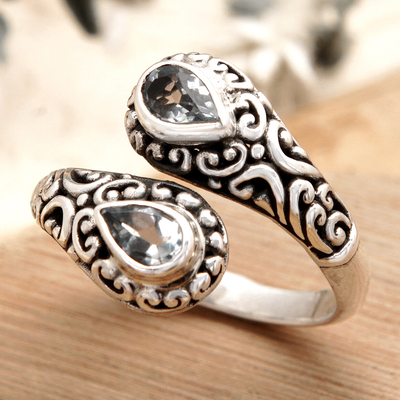 anillo cruzado de topacio azul - Anillo envolvente balinés de plata 925 con dos piedras preciosas de topacio azul