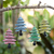Wood ornaments, 'Island's Forest' (set of 4) - Set of 4 Handcrafted Colorful Albesia Wood Tree Ornaments (image 2) thumbail