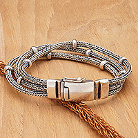 Sterling silver strand chain bracelet, 'Naga Auras' - Classic Polished Sterling Silver Three Strand Chain Bracelet