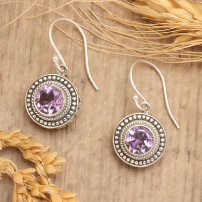 Amethyst dangle earrings, 'Fascinated Gaze' - Balinese Round Sterling Silver and Amethyst Dangle Earrings
