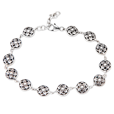 Sterling silver link bracelet, 'Flower Heart' - Polished Floral Sterling Silver Link Bracelet from Bali