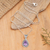 Amethyst pendant necklace, 'Gleam of Wisdom' - Faceted One-Carat Amethyst Pendant Necklace from Bali