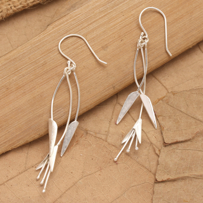 Sterling silver dangle earrings, 'Winter Lily' - Lily-Themed Sterling Silver Dangle Earrings from Bali