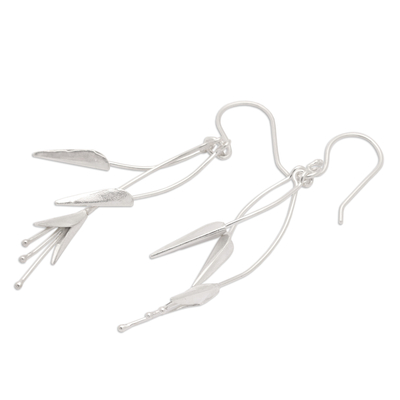 Sterling silver dangle earrings, 'Winter Lily' - Lily-Themed Sterling Silver Dangle Earrings from Bali