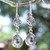 Pendientes colgantes de topacio azul - Pendientes colgantes de plata de ley con topacio azul y motivos de hojas