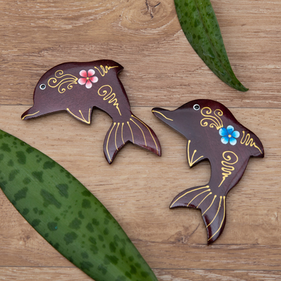 Wood magnets, 'Paradisial Dolphins' (set of 2) - Set of 2 Hand-Painted Floral Dolphin-Shaped Wood Magnets