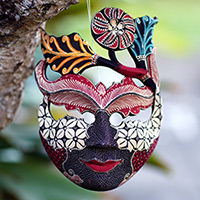 Batik wood mask, 'Princess of Hibiscus' - Handcrafted Hibiscus-Themed Batik Pule Wood Mask from Java