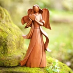 Wood sculpture, 'Sending Love' - Angel-Themed Romantic Suar Wood Sculpture from Bali