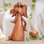 Wood sculpture, 'Sending Love' - Angel-Themed Romantic Suar Wood Sculpture from Bali