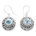 Blue topaz dangle earrings, 'Shimmering Blooms' - Sterling Silver Blue Topaz Dangle Earrings with Vine Motifs
