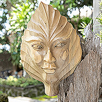 Wood wall art, 'Looking at You' - Hand-Carved Hibiscus Wood Wall Art of Leaf with Face