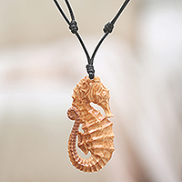 Hand-carved cord pendant necklace, 'Warrior of the Sea'