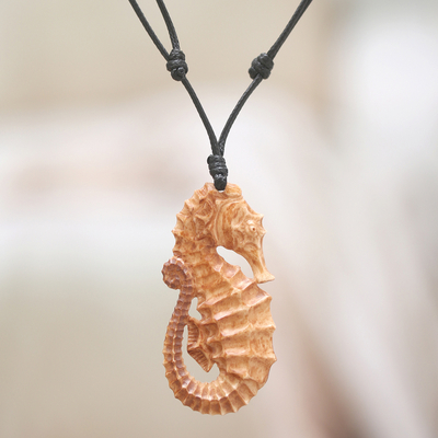 Hand-carved cord pendant necklace, 'Warrior of the Sea' - Hand-Carved Seahorse-Themed Cotton Cord Pendant Necklace