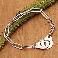 Sterling silver pendant bracelet, 'Cuffed to Style' - High-Polished Sterling Silver Handcuff Pendant Bracelet