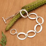 Sterling silver link bracelet, 'Positive Rings' - Modern Minimalist Sterling Silver Link Bracelet from Bali