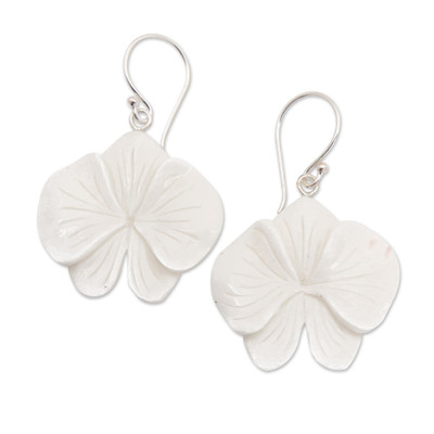 Hand-carved dangle earrings, 'Snowy Orchid' - Hand-Carved Orchid Bloom-Shaped Dangle Earrings