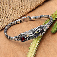 Garnet pendant bracelet, 'Crimson Infinity' - Silver Garnet Pendant Bracelet with Infinity Symbol Motif