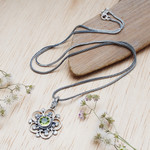 Peridot pendant necklace, 'Wondrous Spring' - Spring-Themed Floral Natural Peridot Pendant Necklace