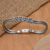 Sterling silver pendant bracelet, 'Fragrant Frangipani' - Frangipani-Themed Sterling Silver Pendant Bracelet from Bali