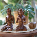 Wood sculptures, 'Beautiful Balinese Couple' (pair) - Two Hand-Carved Meditating Balinese Couple Wood Sculptures