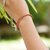 Leather braided bracelet, 'Braided Dream in Brown' - Handmade Brown Leather and Sterling Silver Braided Bracelet