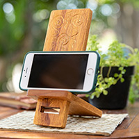 Wood phone stand, 'Hypnotic Spirals' - Hand-Carved and Painted Wood Phone Stand with Spiral Motifs