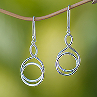 Dangle earrings, 'Harmonious Twists' - High-Polished Silver-Plated Brass Dangle Earrings from Bali