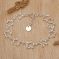 Sterling silver link bracelet, 'Serpentine Stars' - High-Polished Serpentine Star Sterling Silver Link Bracelet
