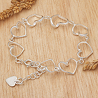 Sterling silver link bracelet, 'Linked Romance' - Polished Romantic Heart-Themed Sterling Silver Link Bracelet
