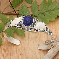 Lapis lazuli cuff bracelet, 'Lunar Twins' - Moon-Themed Seven-Carat Lapis Lazuli Cuff Bracelet from Bali