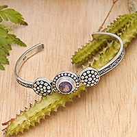 Amethyst cuff bracelet, 'Eternal Wisdom' - Balinese Sterling Silver Cuff Bracelet with Faceted Amethyst