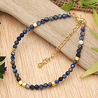 Gold-accented lapis lazuli beaded bracelet, 'Gold in the Night Sky' - 18k Gold-Accented Lapis Lazuli Beaded Bracelet from Bali