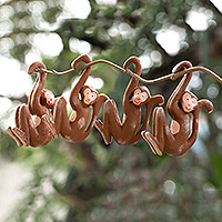 Wood ornaments, 'Joyful Jungle' (set of 4) - Set of 4 Hand-Carved Albesia Wood Monkey Ornaments from Bali