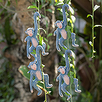 Wood ornaments, 'Gleeful Jungle' (set of 4) - Set of 4 Hand-Painted Blue Albesia Wood Monkey Ornaments