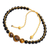 Onyx and tiger's eye beaded bracelet, 'Power of Earth' - Adjustable Onyx and Tiger's Eye Beaded Bracelet from Bali