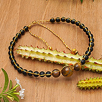 Gold-accented onyx and tiger's eye beaded bracelet, 'Chakra of Earth' - Gold-Accented Onyx and Tiger's Eye Beaded Bracelet from Bali