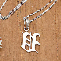 Sterling silver pendant necklace, 'Letter V' - Letter V-Shaped Sterling Silver Pendant Necklace from Bali