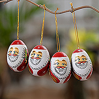 Wood ornaments, 'Eggy Claus' (set of 4) - Classic Set of 4 Egg-Shaped Albesia Wood Santa Ornaments