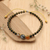 Multi-gemstone beaded bracelet, 'Light in Darkness' - Fair Trade Adjustable Unisex Multi-Gemstone Beaded Bracelet