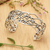 Sterling silver cuff bracelet, 'Orient Bloom' - Oriental Spring-Themed Floral Sterling Silver Cuff Bracelet