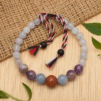 Aquamarine and amethyst beaded bracelet, 'Times of Wisdom' - Adjustable Aquamarine and Amethyst Beaded Bracelet from Bali