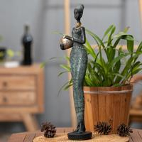 Resin sculpture, 'Honey Dame' - Antiqued Dark Green Resin Sculpture of Woman and Honey Jug