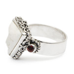Garnet cocktail ring, 'Triangle Face' - Silver Garnet Cocktail Ring with Carved Triangular Face