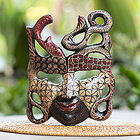 Wood mask, 'Classic Woman' - Hand-Drawn Batik-Patterned Pule Wood Mask Crafted in Java