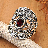 Garnet cocktail ring, 'Eye for Passion' - Balinese-Made Folk Art One-Carat Oval Garnet Cocktail Ring