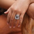 Garnet cocktail ring, 'Eye for Passion' - Balinese-Made Folk Art One-Carat Oval Garnet Cocktail Ring