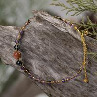 Amethyst and obsidian beaded bracelet, 'Sagacious Mind' - Amethyst and Obsidian Beaded Bracelet with Golden Accents